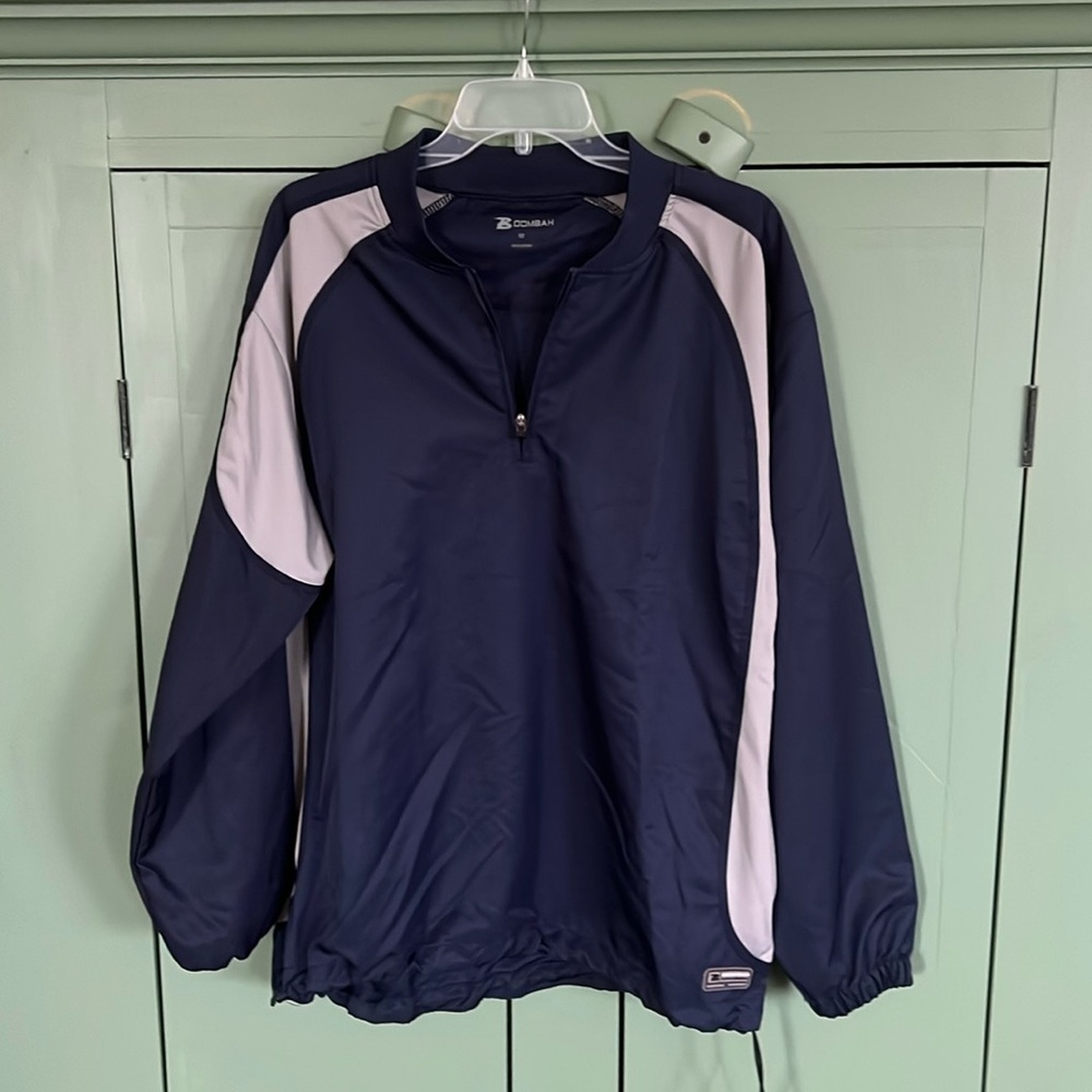 BOOMBAH navy blue and tan quarter zip pull over, has drawstring at bottom